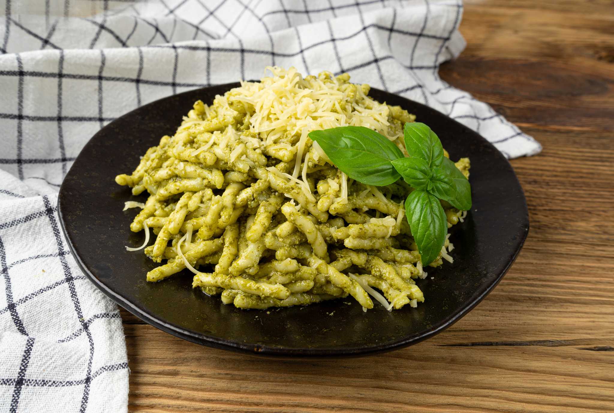 Trofie al pesto, a typical dish of the Liguria region in Italy.