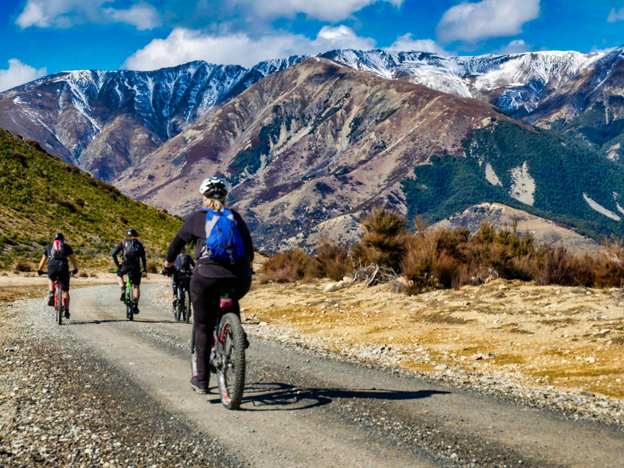 Cycling towards Mount White Station through Arthurs Pass National Park, New Zealand