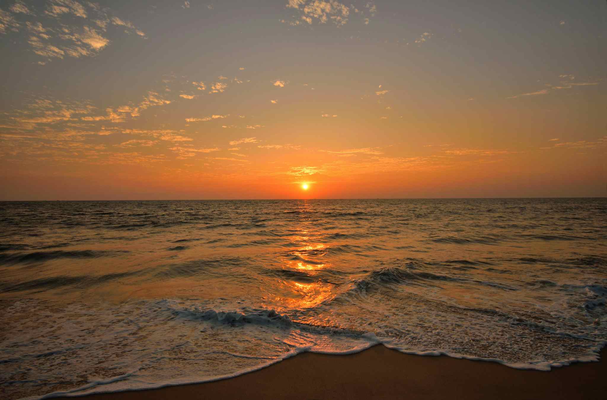 Sunset on the beach in Kerala, India. 