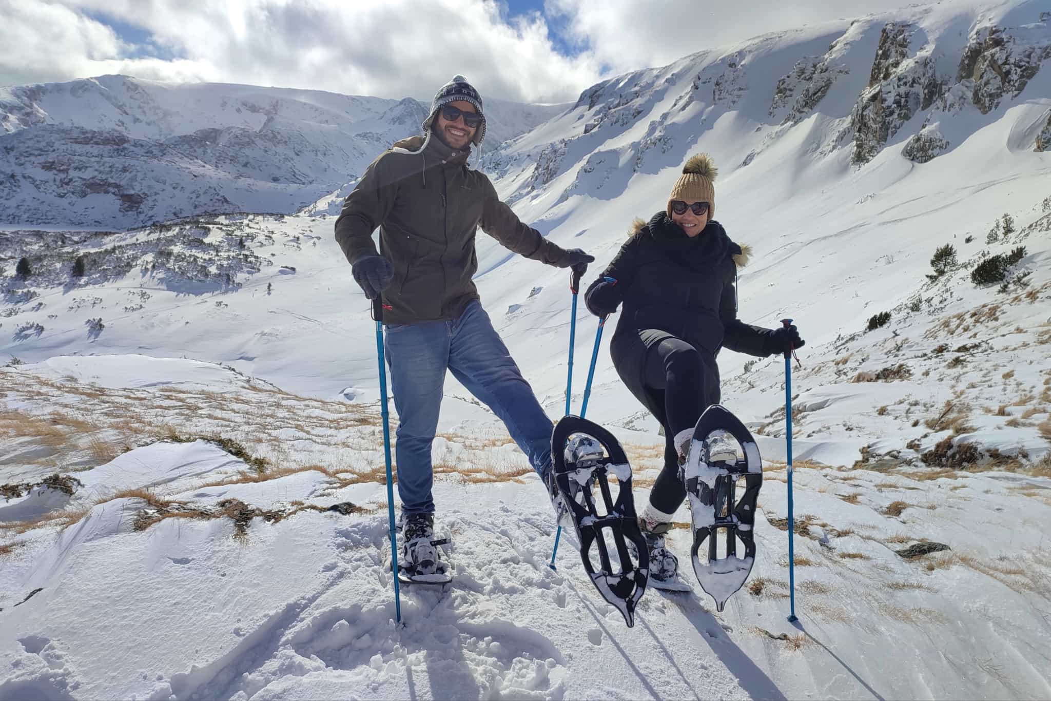 Male and female snowshoers enjoying the snow in the Bulgarian mountains.