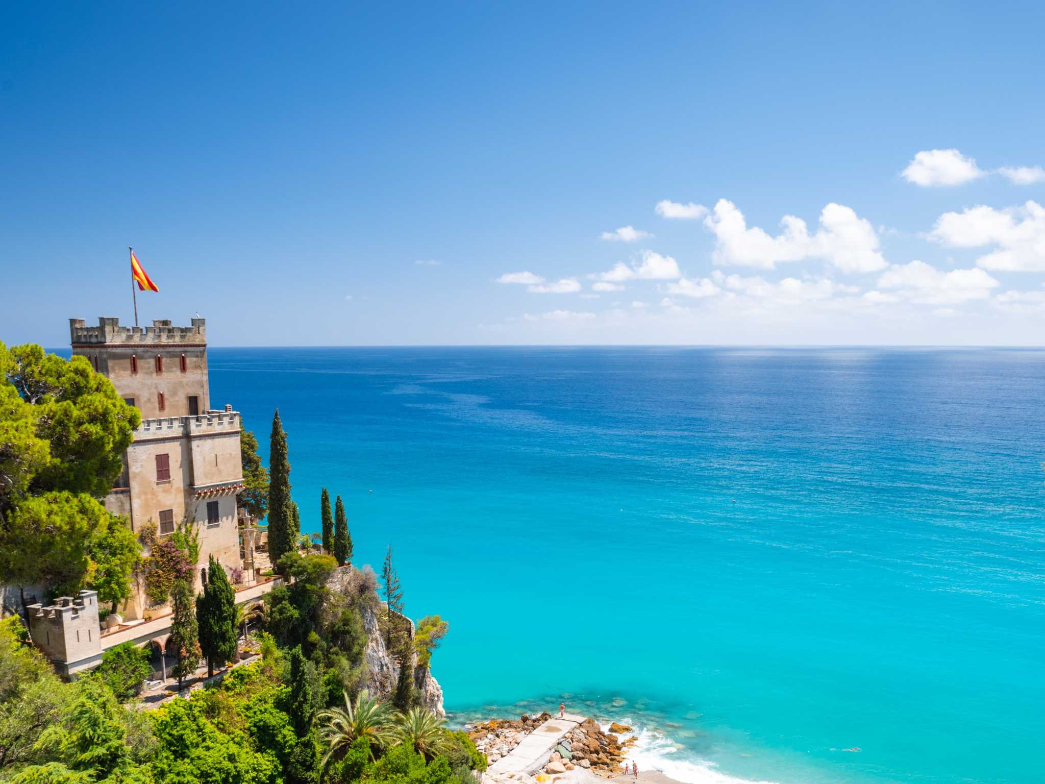 View of the sea and beach in Finale Ligure, Capo Castelletto, Italy.