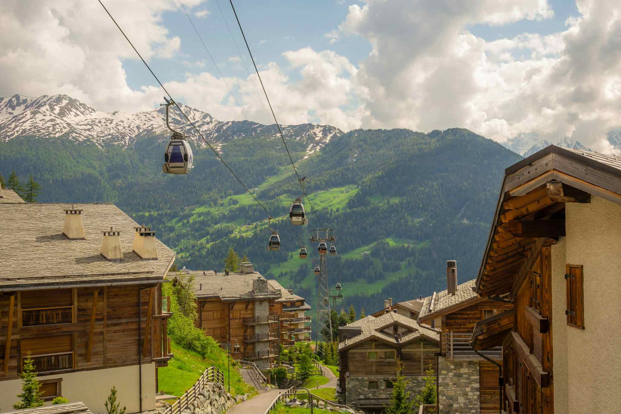 Gondola climbing out of the town of Verbier to the mountains.