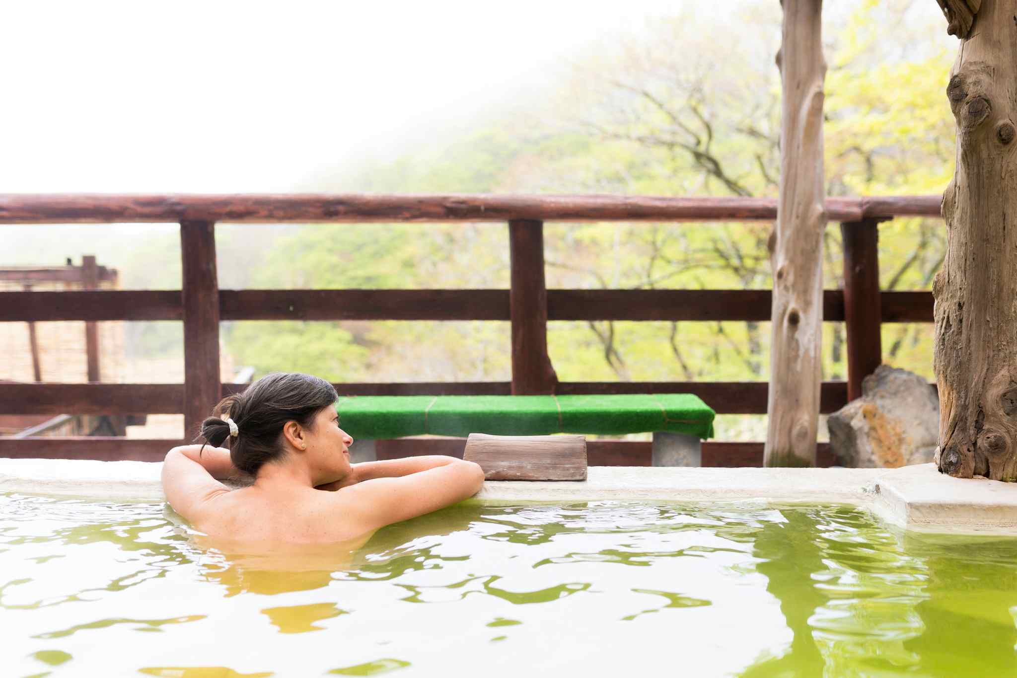Bathing in hot springs, Japan. Photo: GettyImages-1492294184