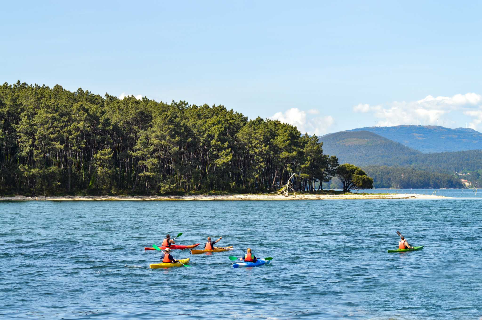 Kayakers on a section of the Camino del Mar, Galicia, Spain.