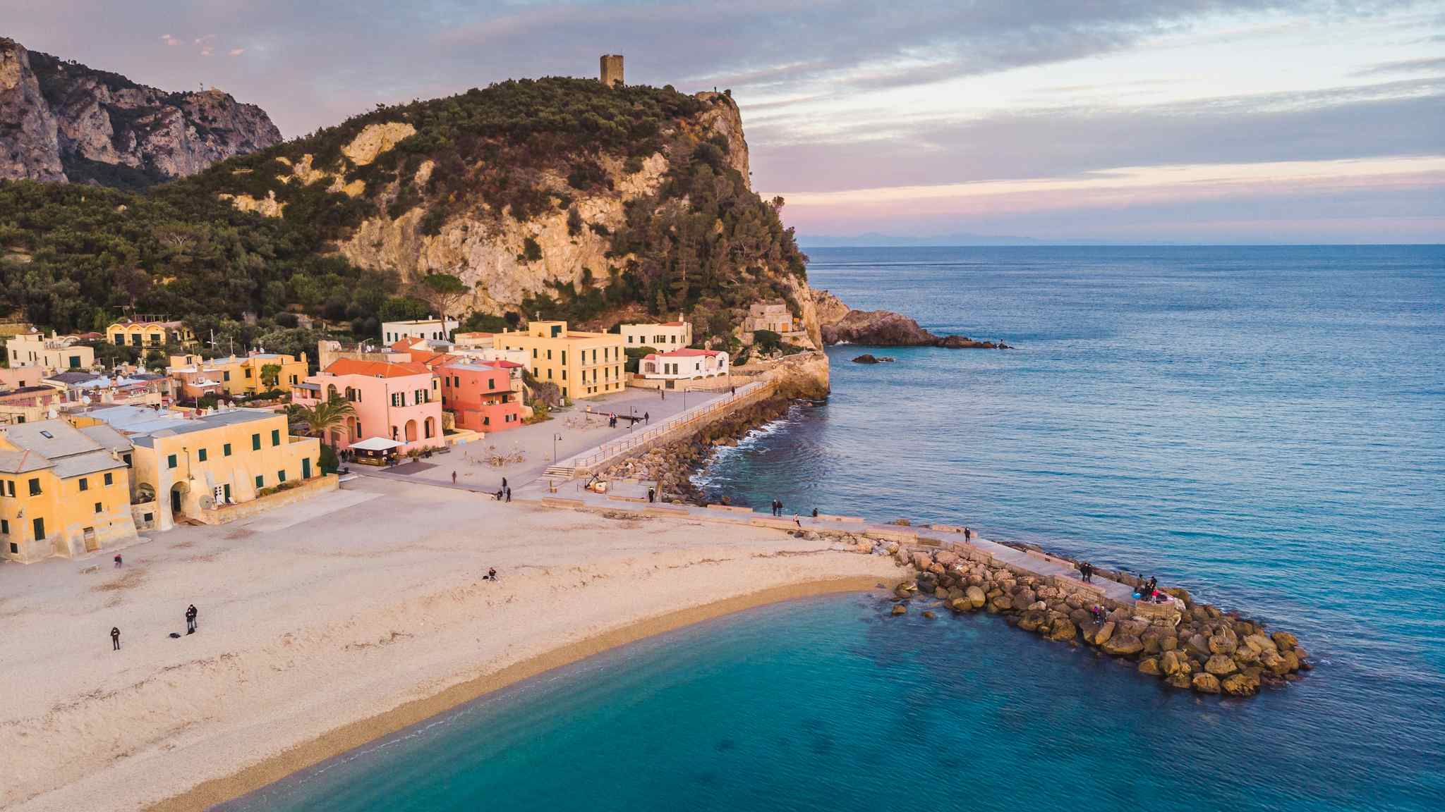 Varigotti Beach on the Italian Riviera at sunset.