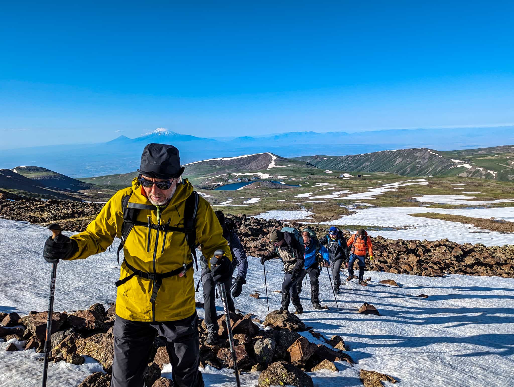 Group of trekkers climbing Mount Aragats in Armenia