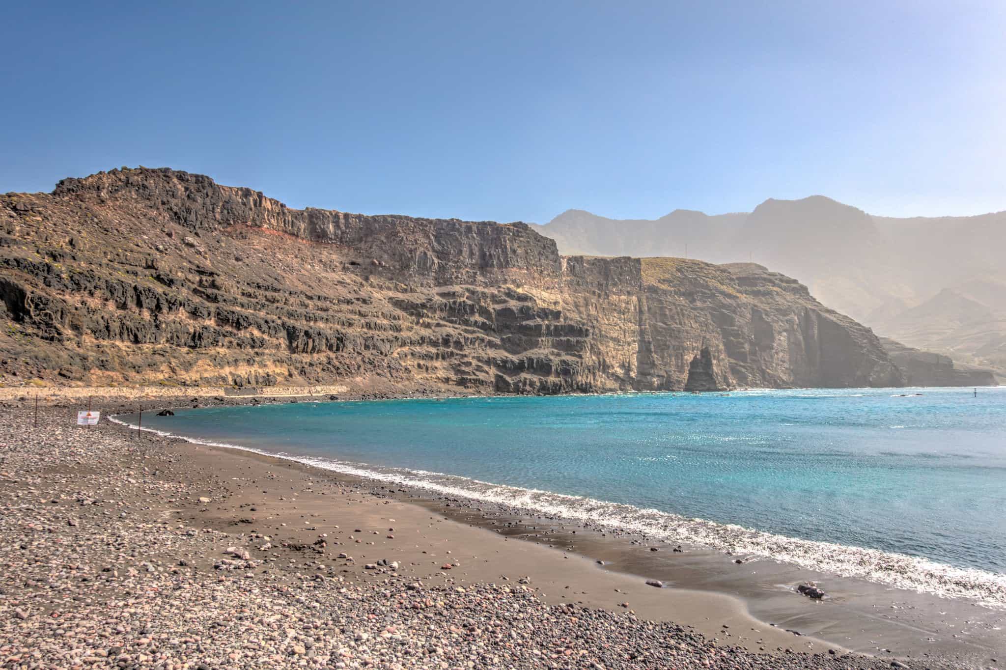 Pebble beach with cliffs in the background, Agaete, Gran Canaria