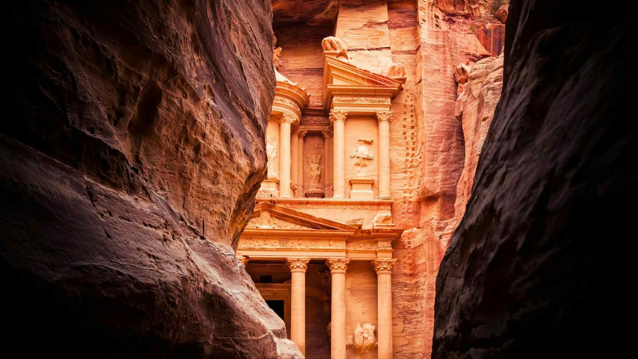 The end of the Siq, with its dramatic view of Al Khazneh ('The Treasury'), Jordan. Photo: iStock-467158379