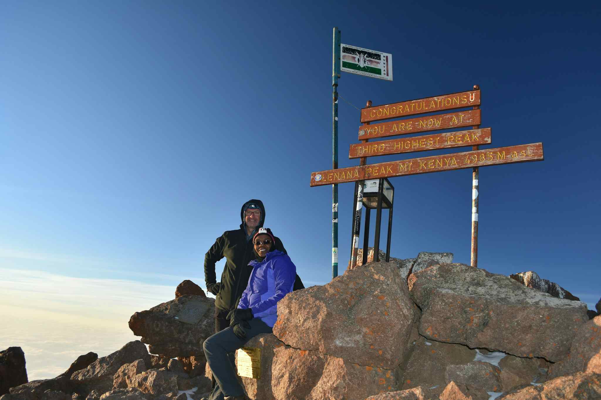 Hikers summit at Point Lenana on Mount Kenya