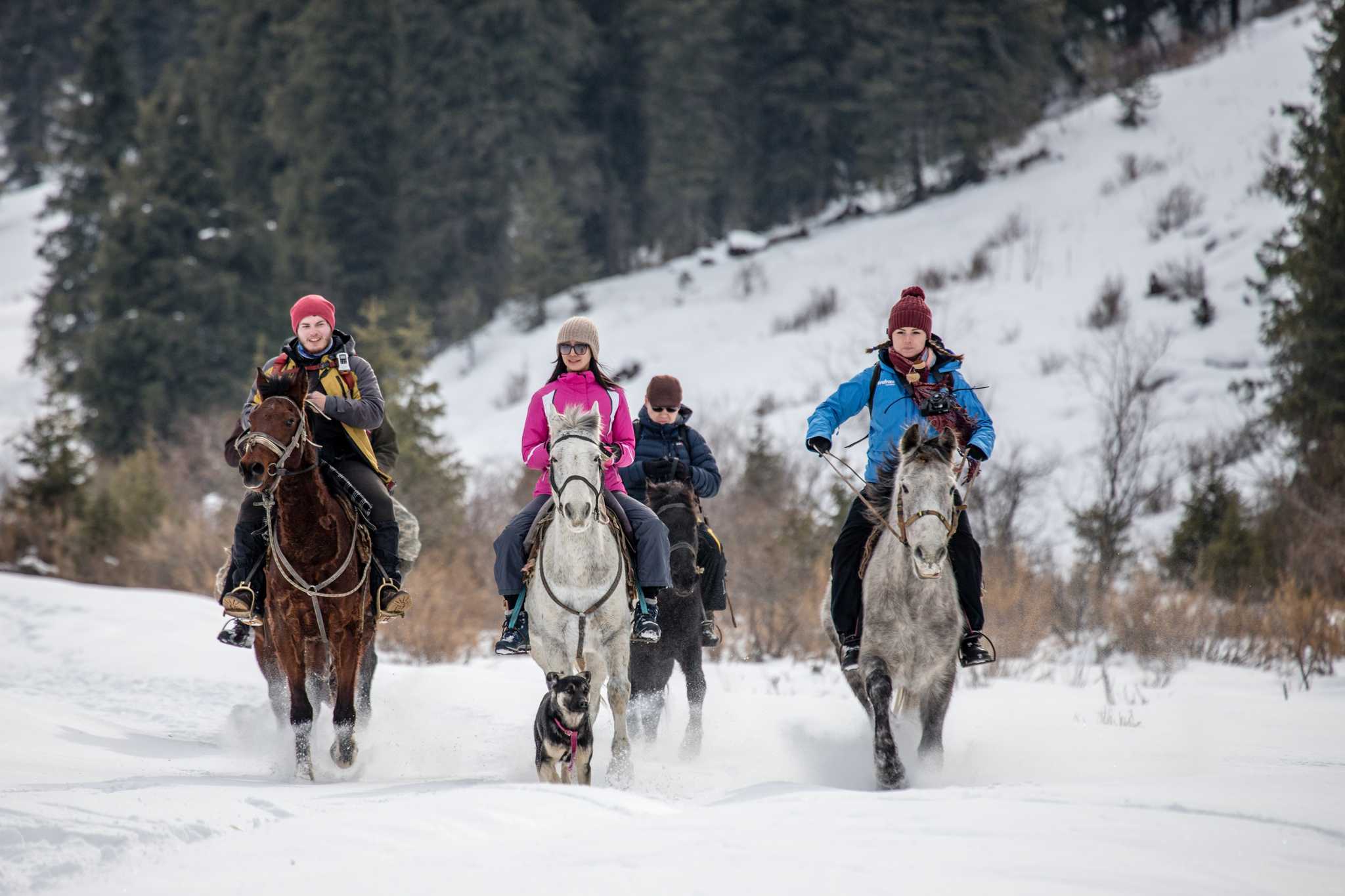 Horse riding in the snow in Kyrgyzstan