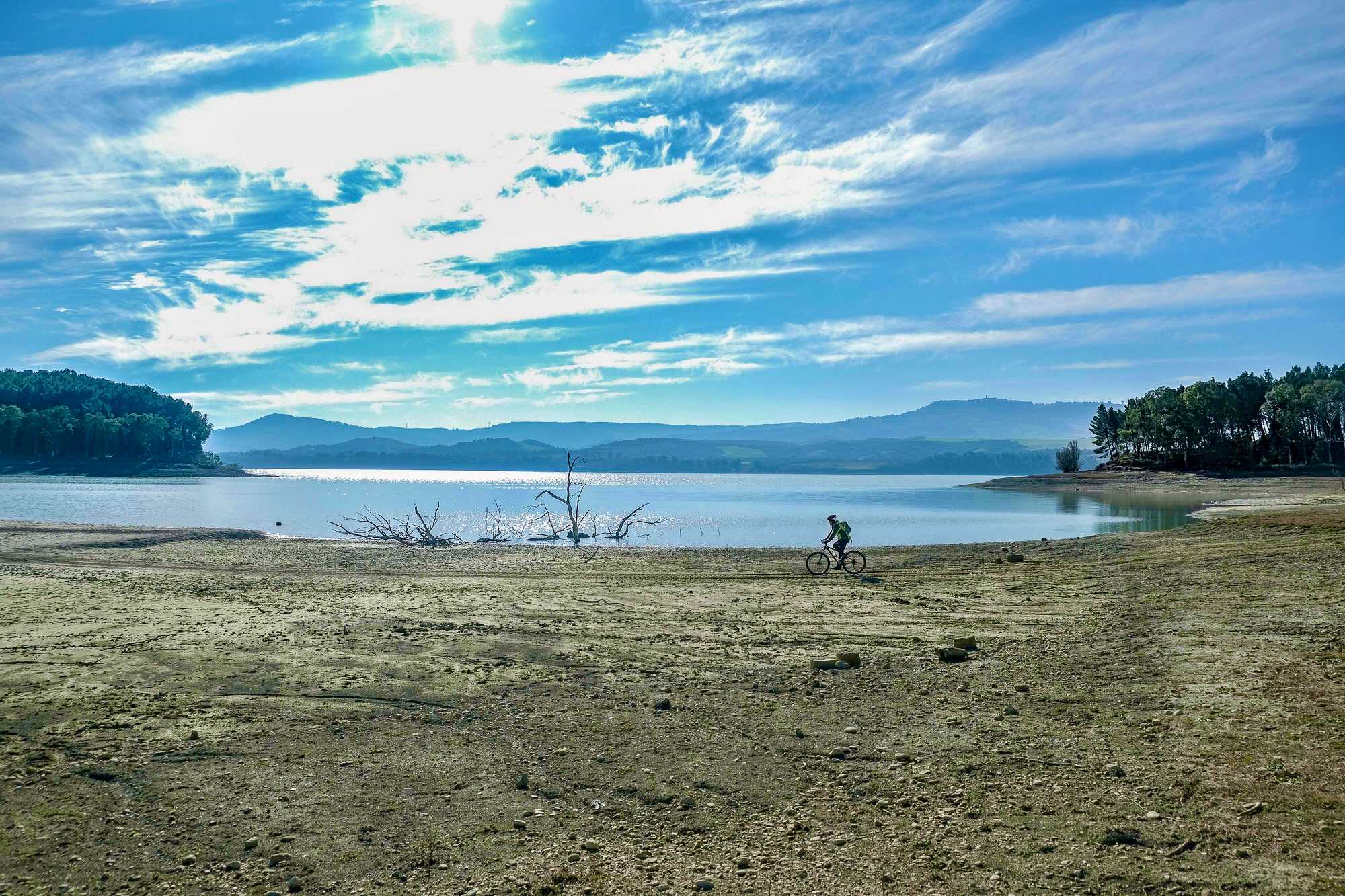 Person on an e-bike in San Giuliano, Italy.