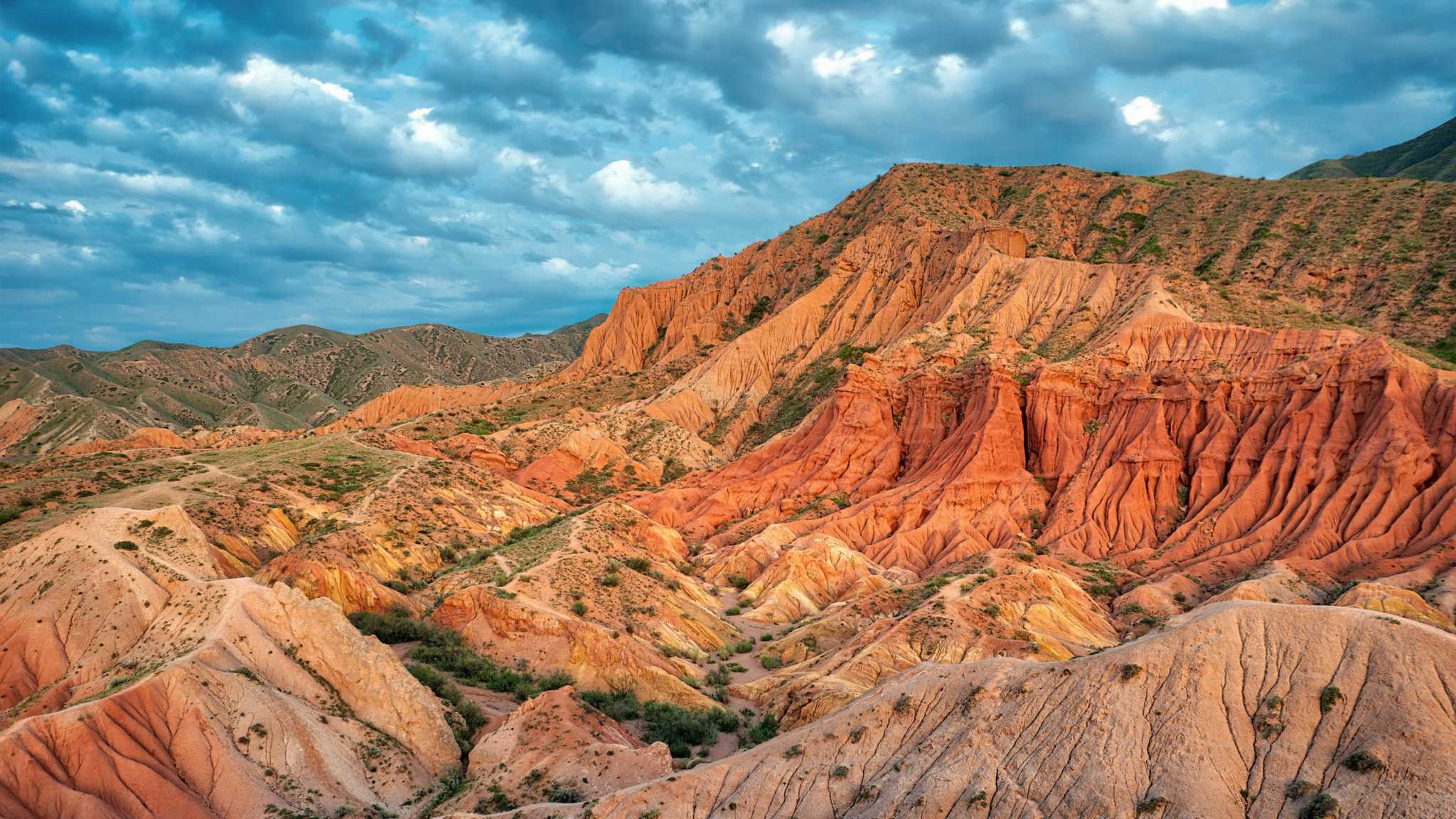 The red striated rock of Skazka Canyon in Kyrgyzstan.