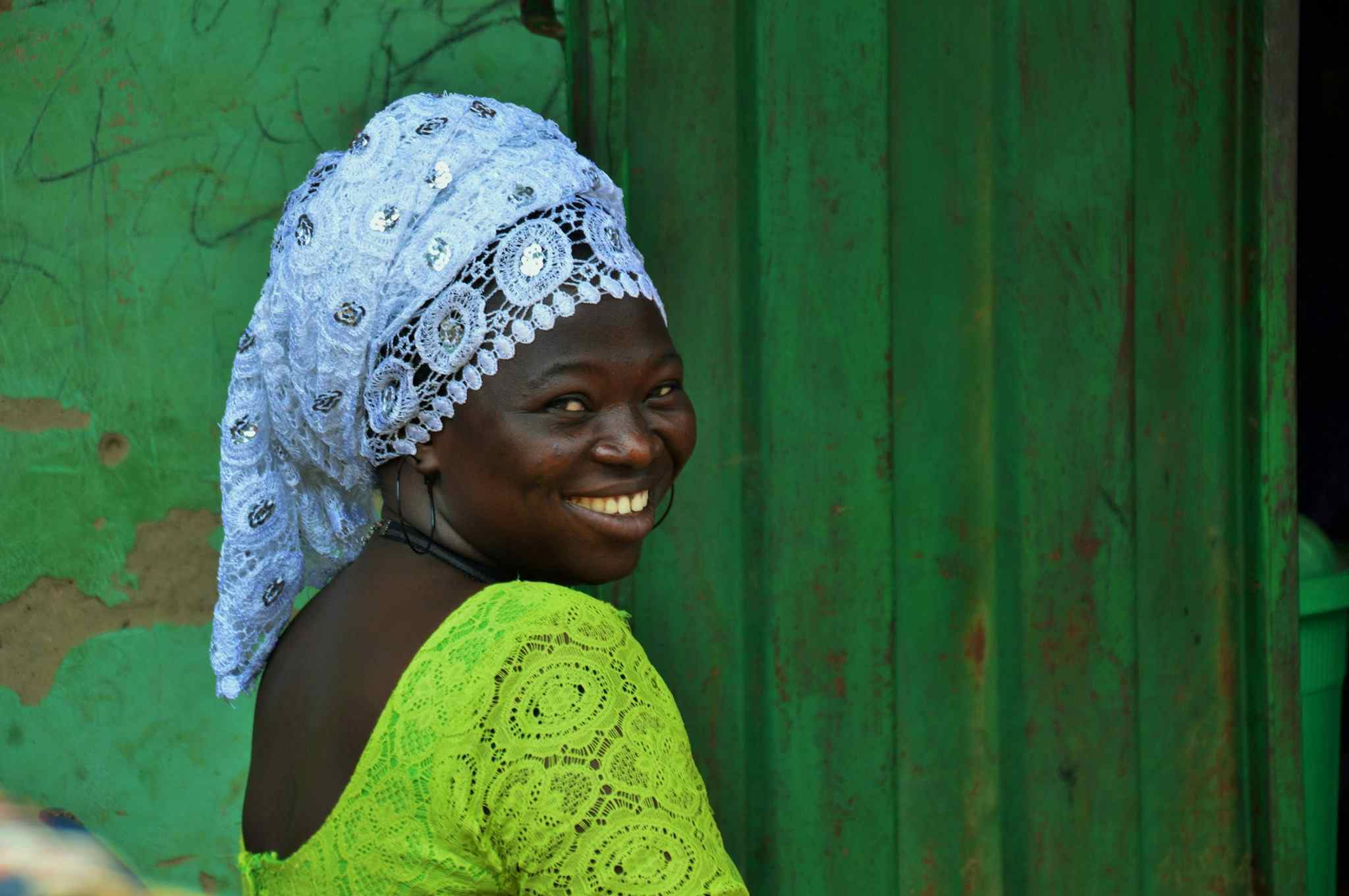 Local woman in Ghana wearing colourful clothes.