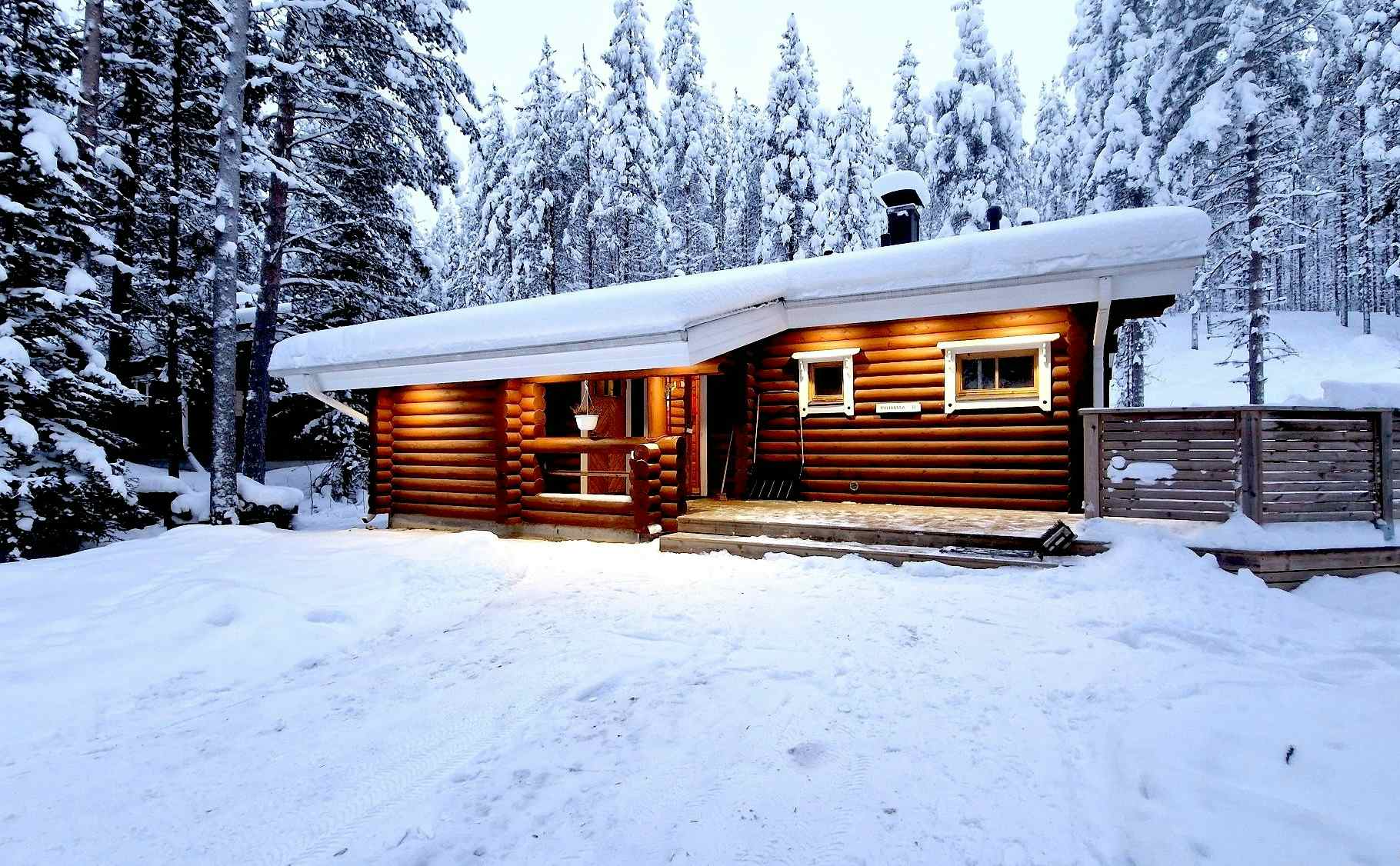 Wilderness cabins with snow on the roof in Pyha, Finland