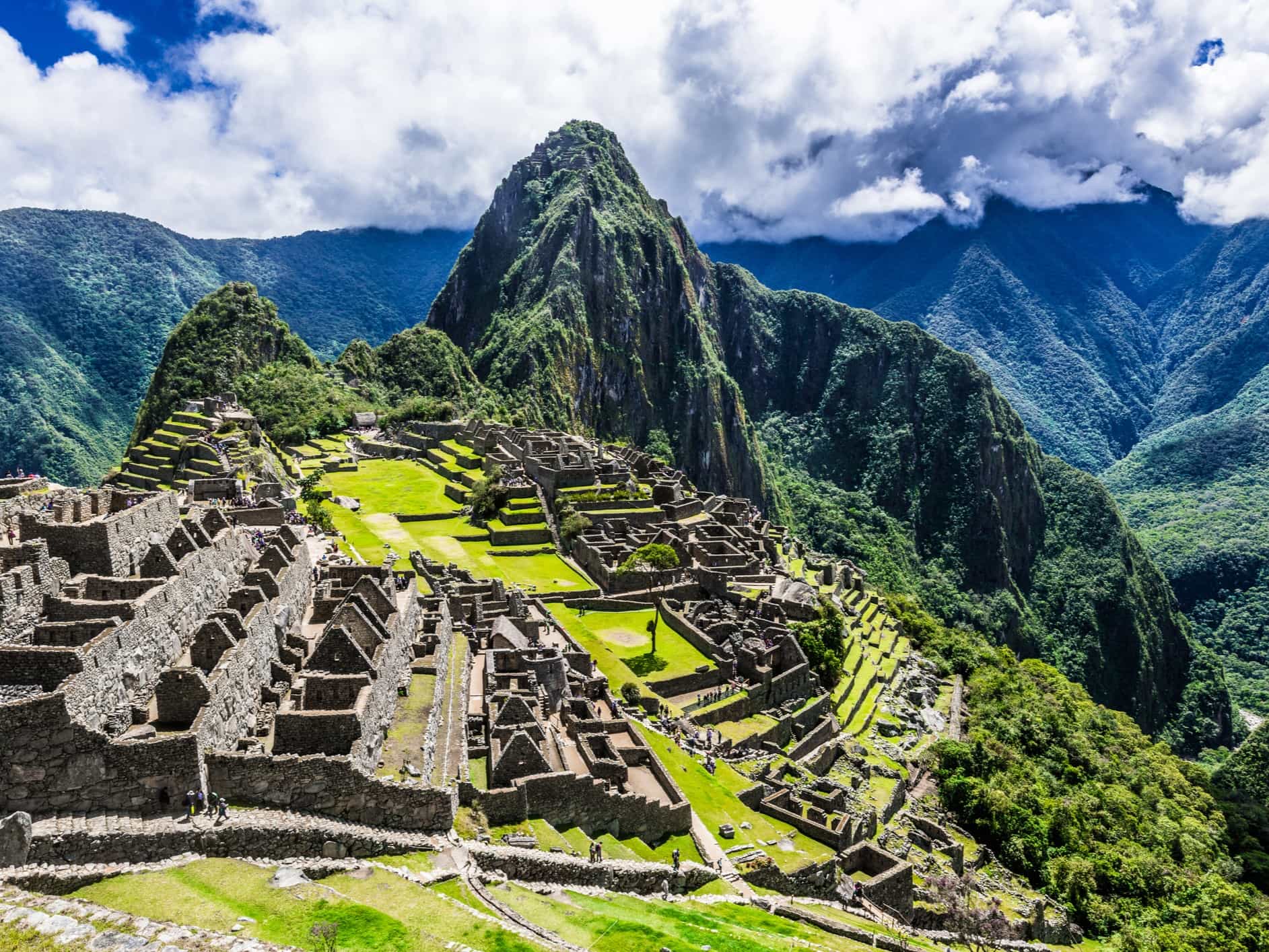 The ruins of the ancient Inca city of Machu Picchu are beautifully located on the slopes of the Andes over the turbulent waters of the Urubamba river.