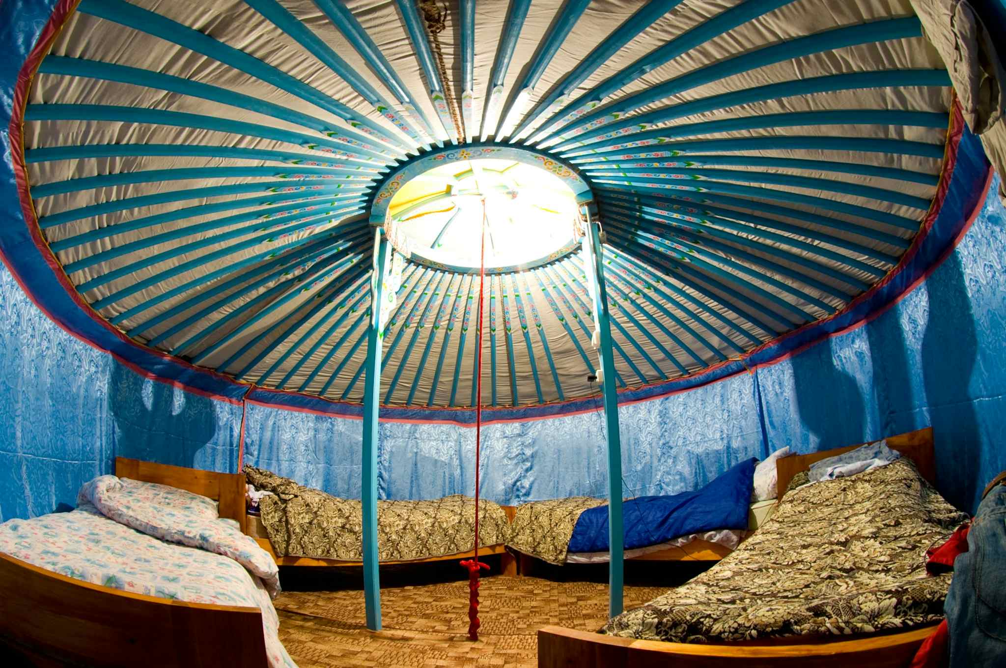 Yurt interior with four beds in a circle