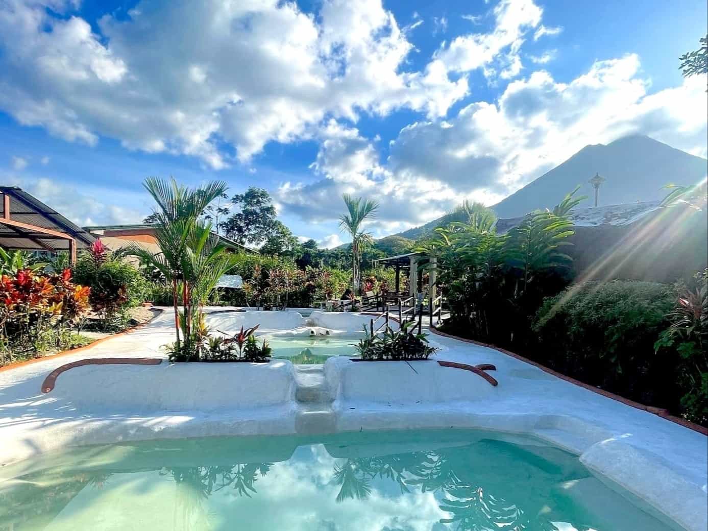 Swimming pool with a view of Arenal volcano in the background