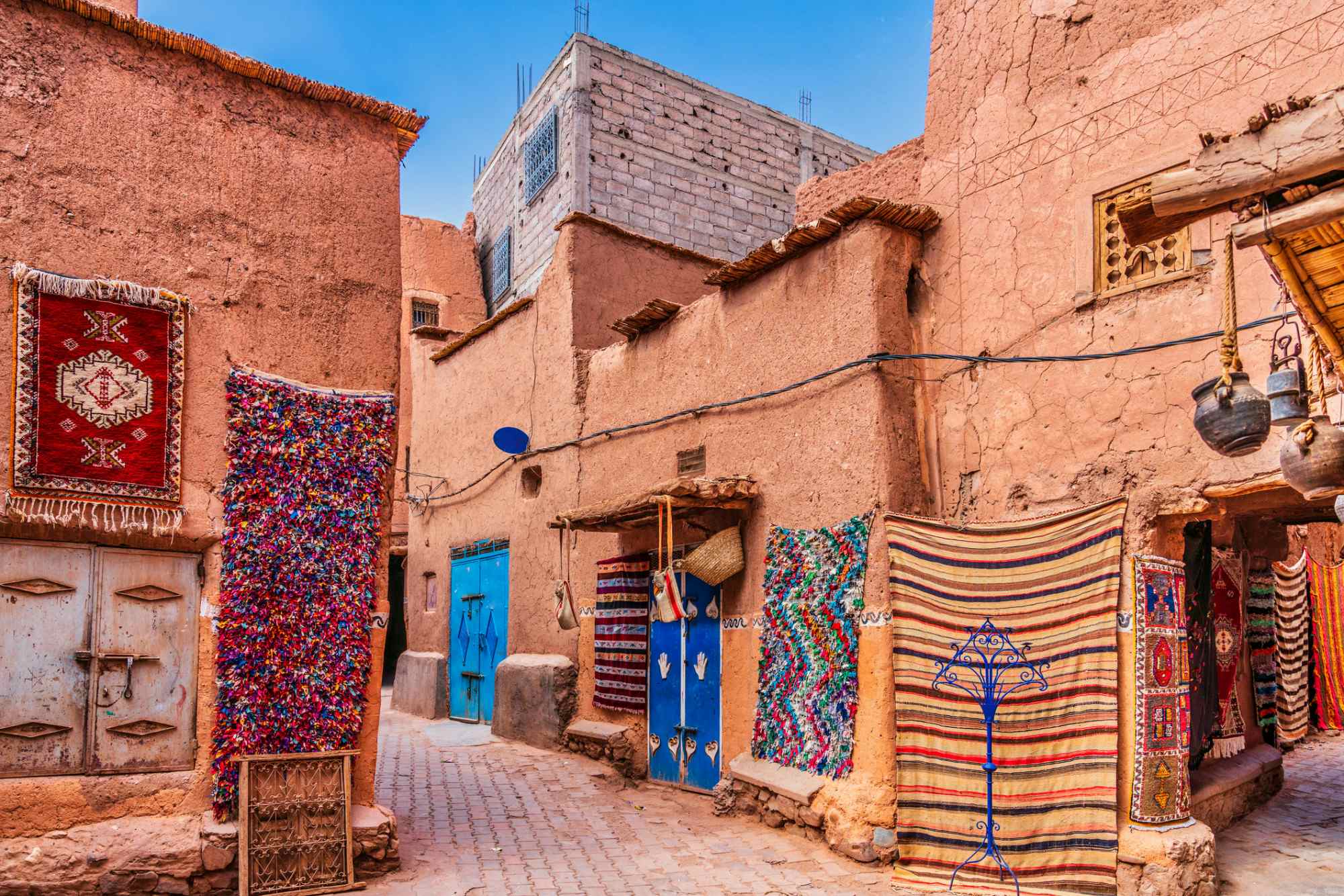 Colourful rugs hanging in the medina in Morocco