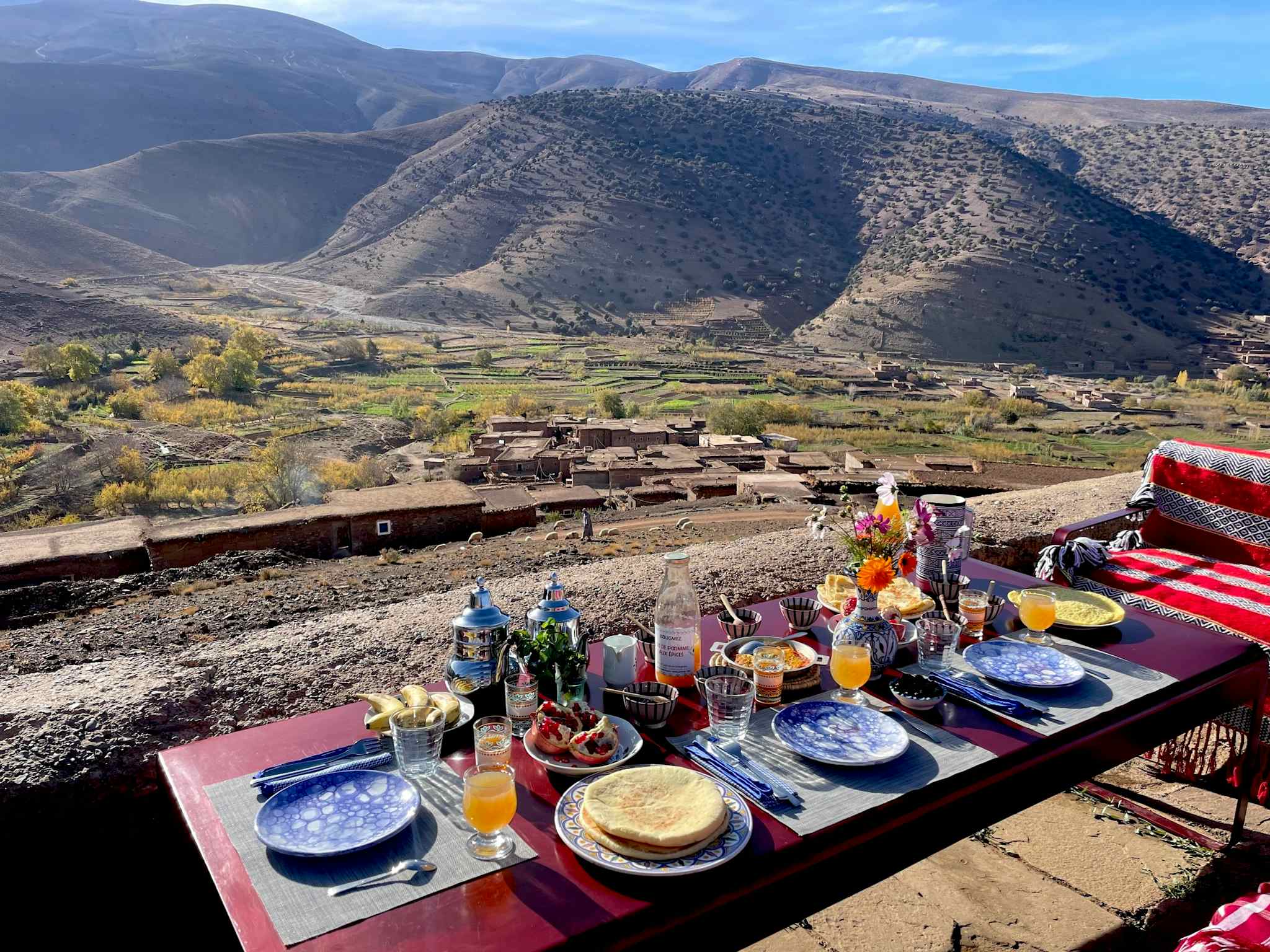 Table laid for lunch with a view of the Atlas Mountains in Morocco