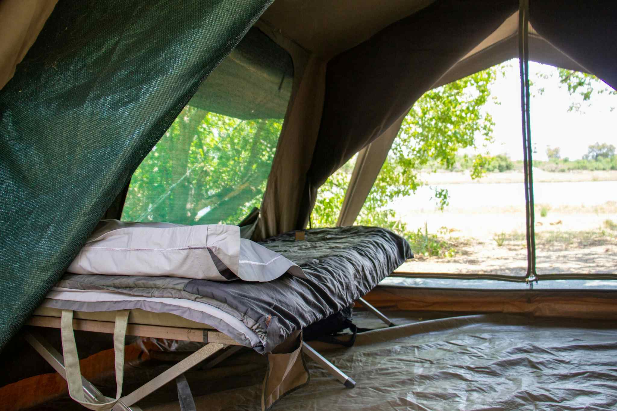 Inside a safari tent at an Okavango Delta wilderness camp, Botswana