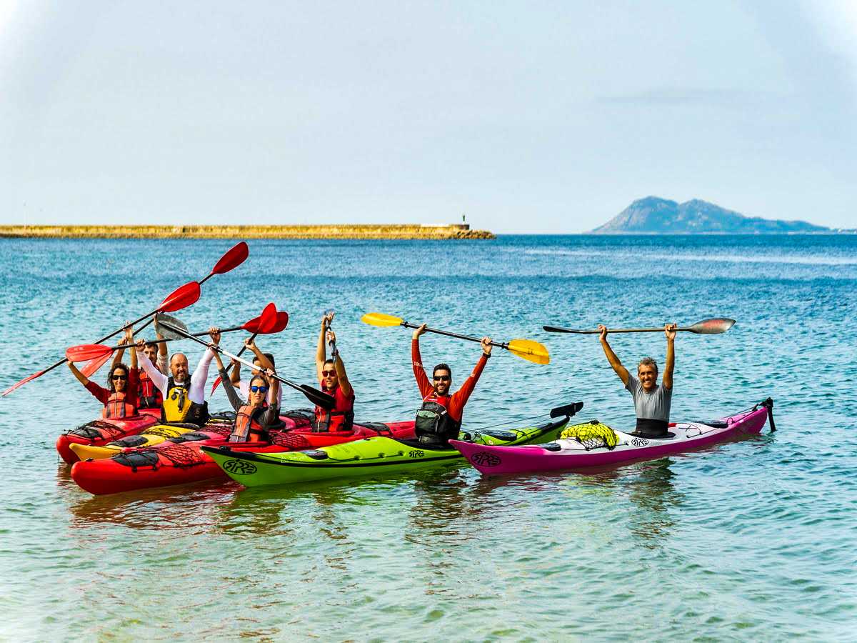 Kayakers on the Camino del Mar, Galicia, Spain. 