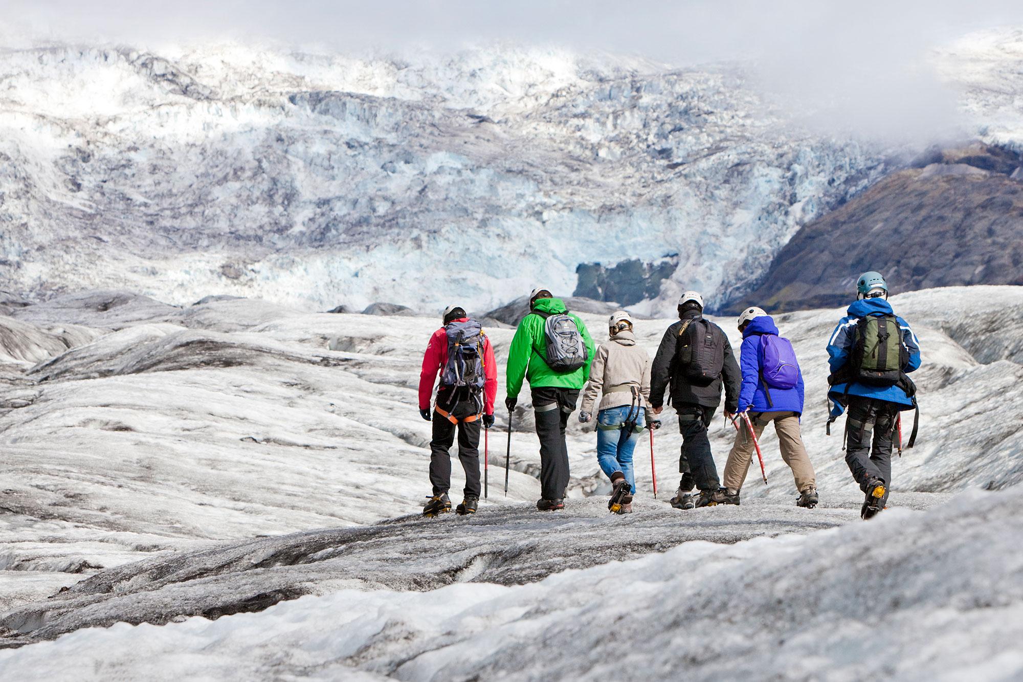 Winter Hiking and Ice Climbing Beneath the Aurora in Iceland