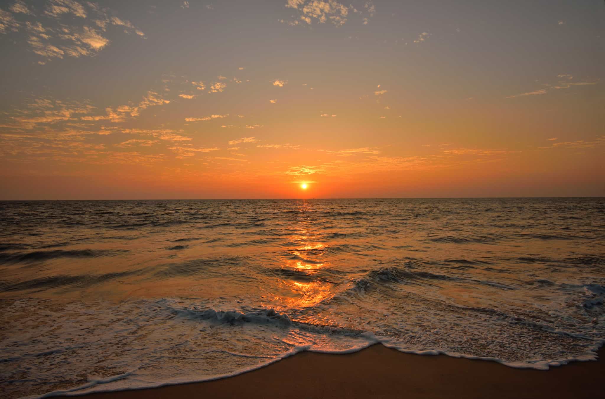 Sunset on the beach in Kerala, India.