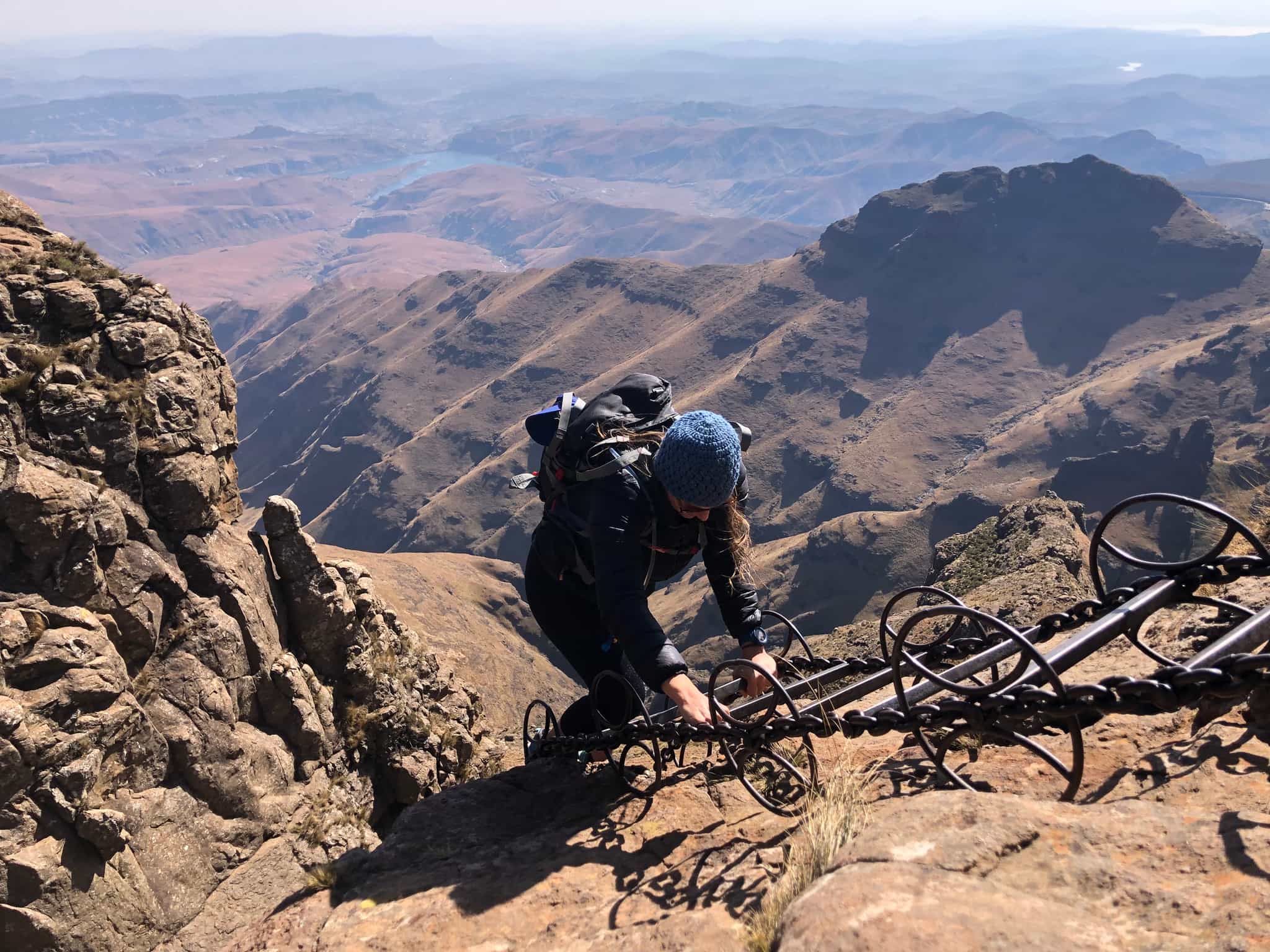 Hiker tackling a ladder section on Drakensberg Mountains. Photo: Host/Active Escapes