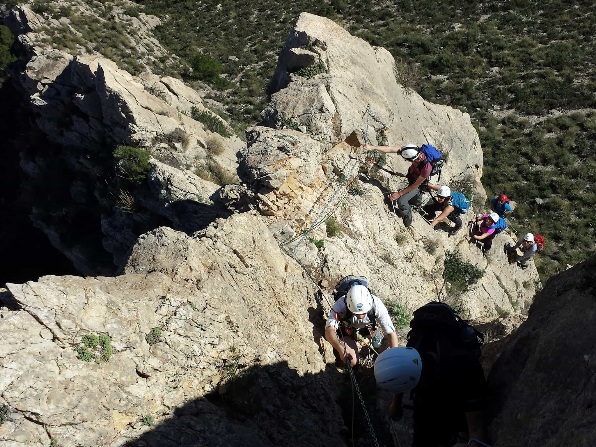 Climbers on a via ferrata in Alicante, Spain