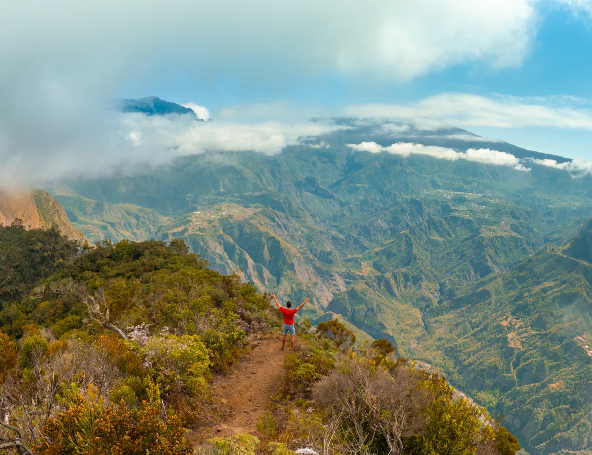Trekker at a viewpoint on Reunion Island