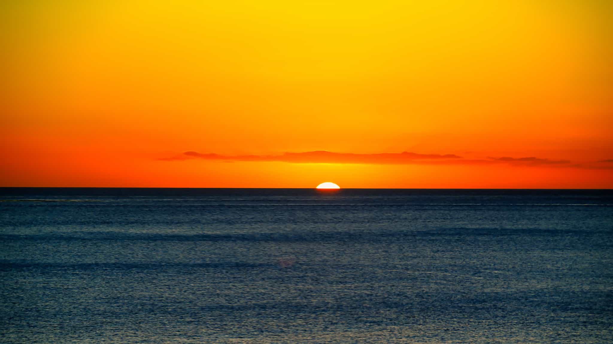 Sunset on Dominica in the Caribbean. Photo: GettyImages-1396513577