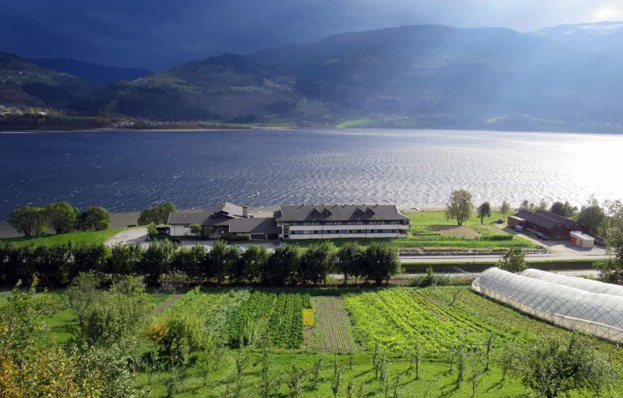 An aerial view of a hostel on the fjord edge in Voss, Norwegian Fjords.