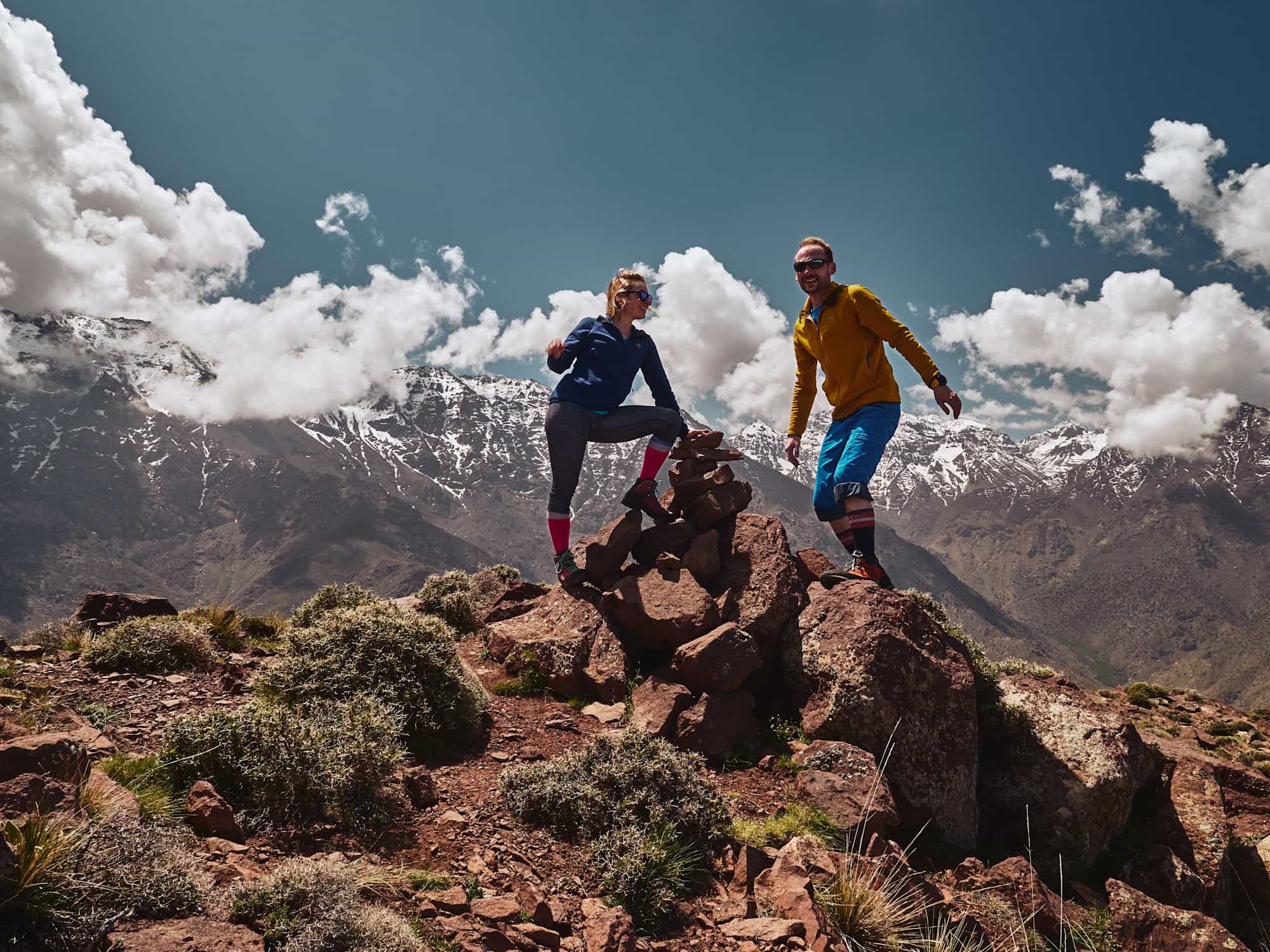 Couple stand on top of a peak in the Atlas Mountains