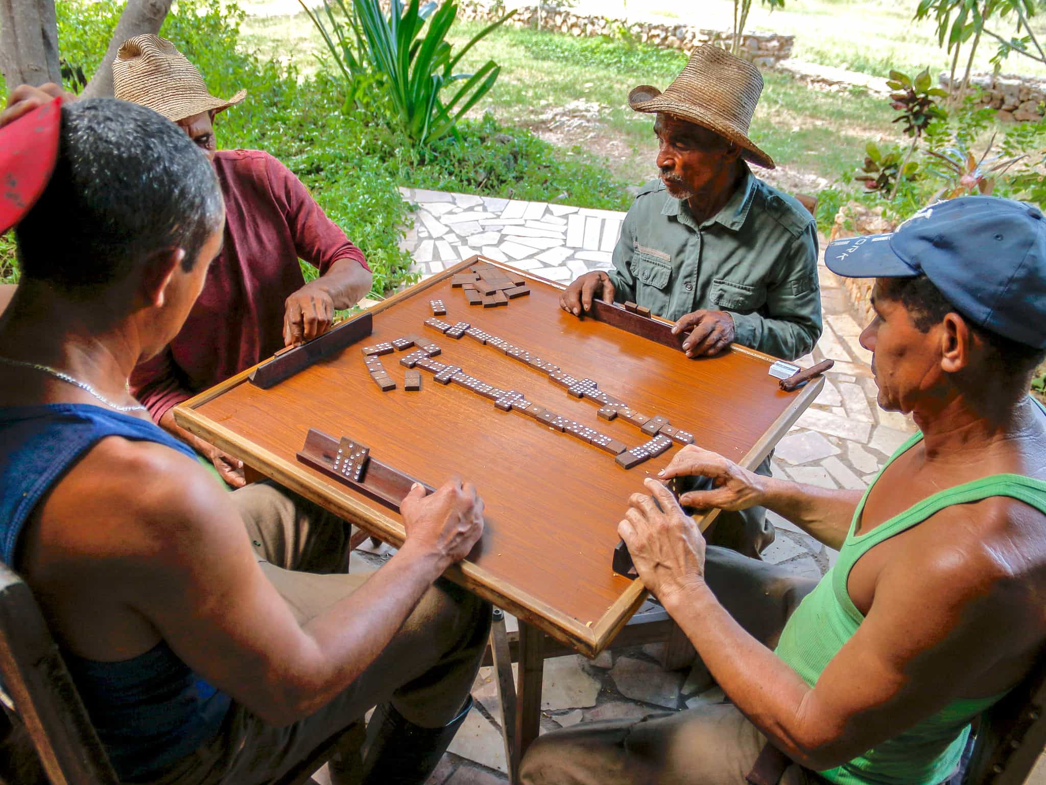 Men playing a game of dominoes