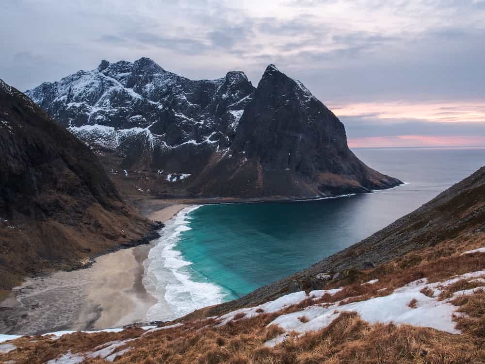 Kvalvika Beach in the Lofoten Islands at sunrise in winter.