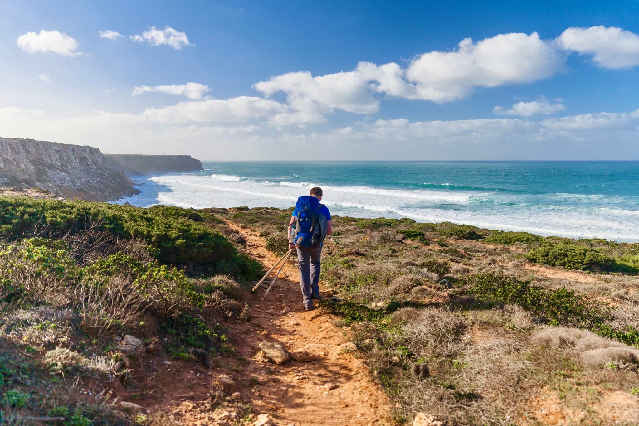 Hiker along Portugal's Fishermen's Trail, Rota Vicentina.
