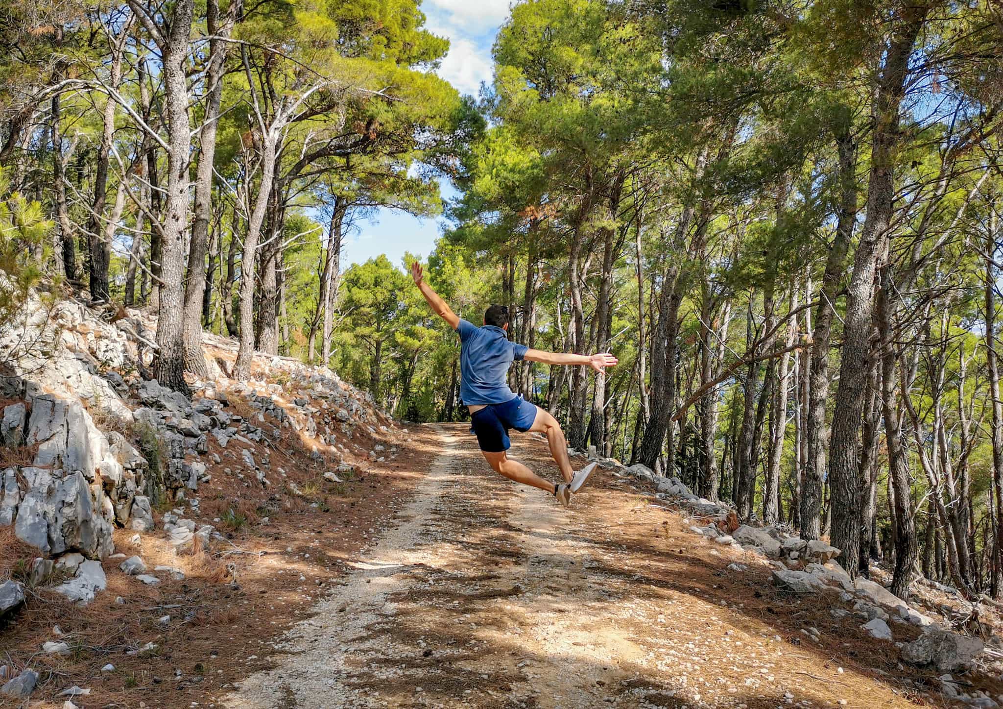 Man hiking in the forest in Istria.