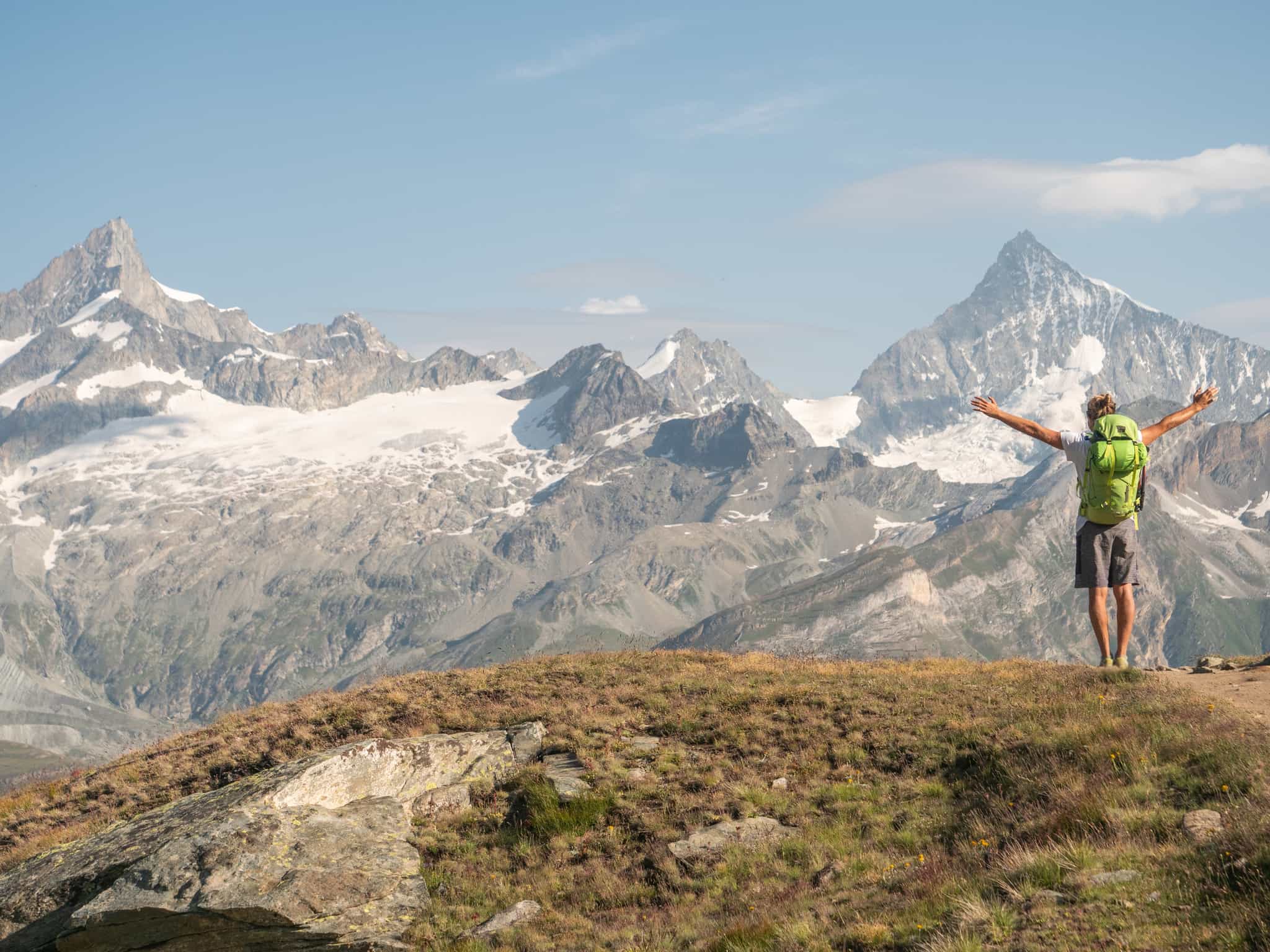 Hiker in the Swiss Alps. Photo: GettyImages-1392538363