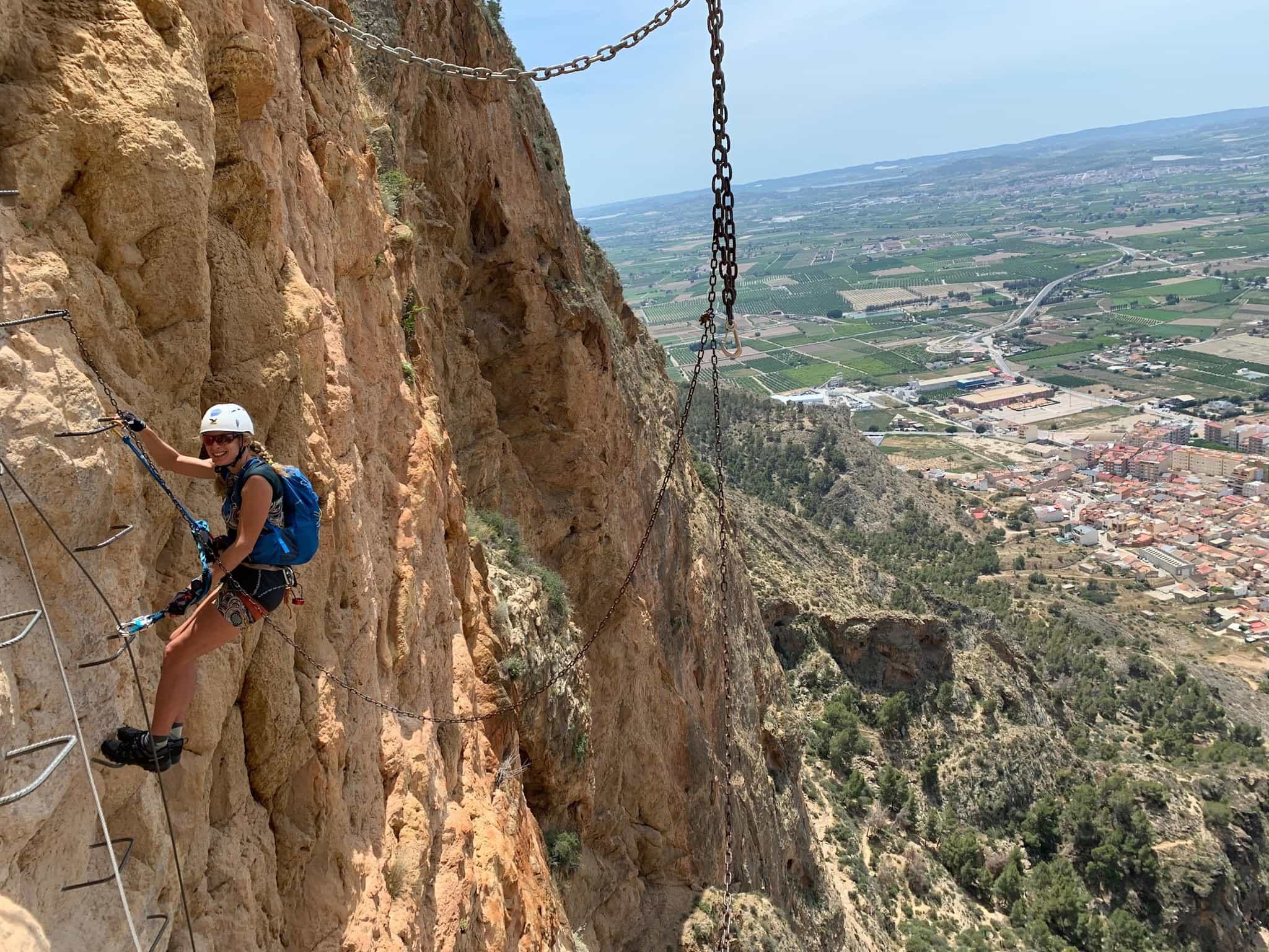 Woman high on a via ferrata in the Alicante region of Spain