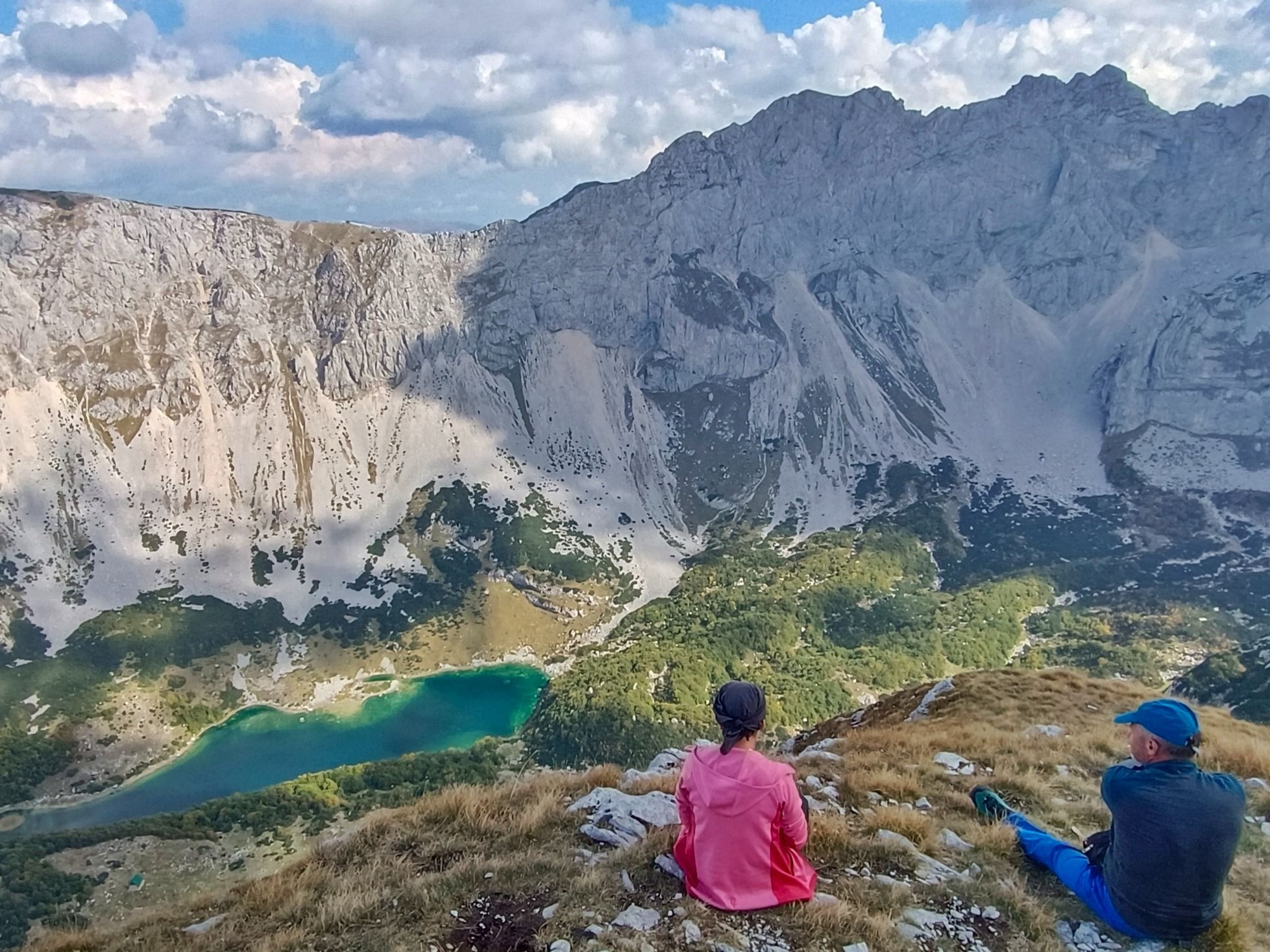 Hikers admire the view from Prutaš, of Skrčka Lake and Bobotov Kuk. Photo: Wild Montenegro.