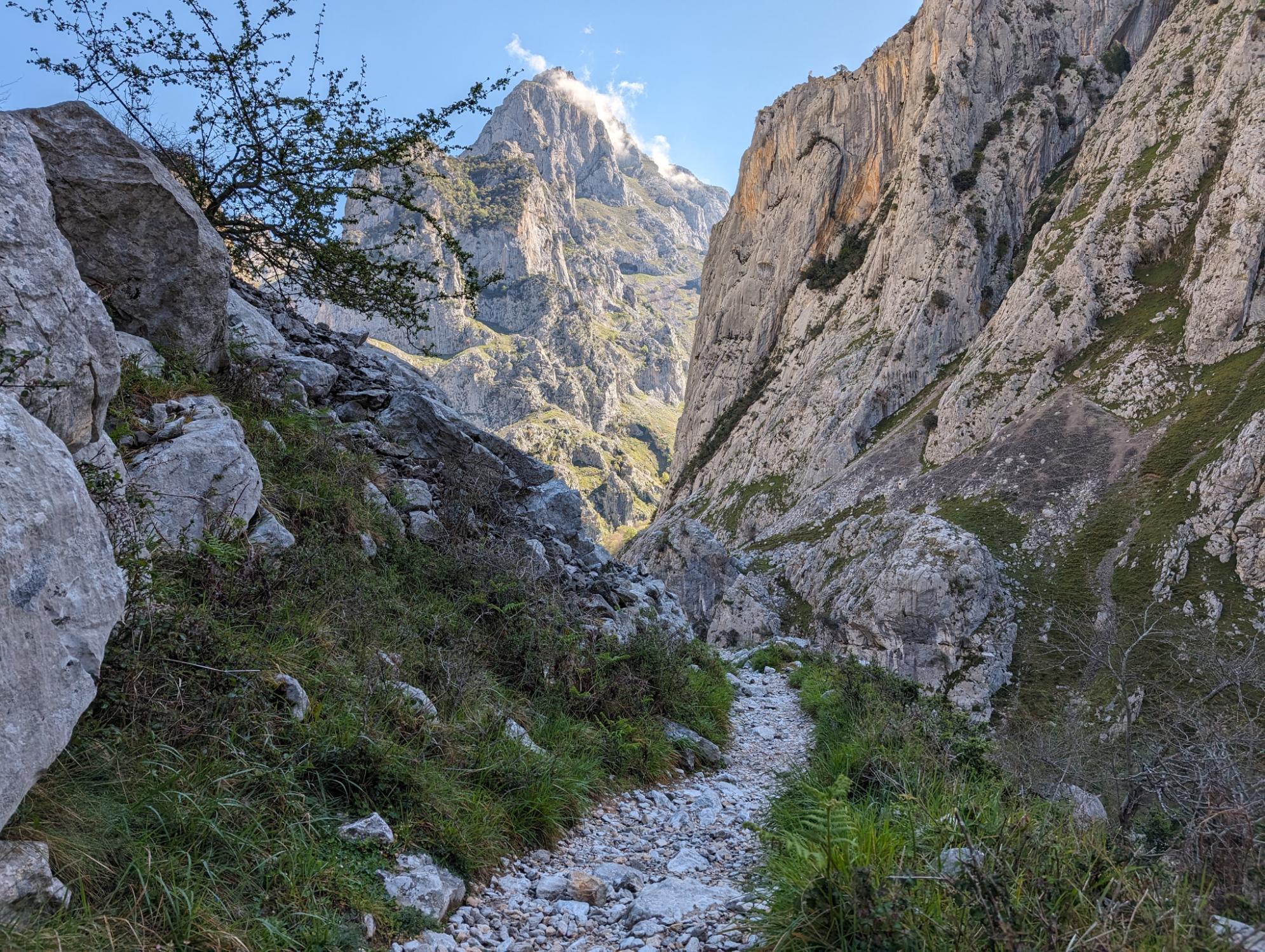 An early view back to Ariscu Sonllanu, which towers over the start of the Ruta del Cares walk. Photo: Stuart Kenny