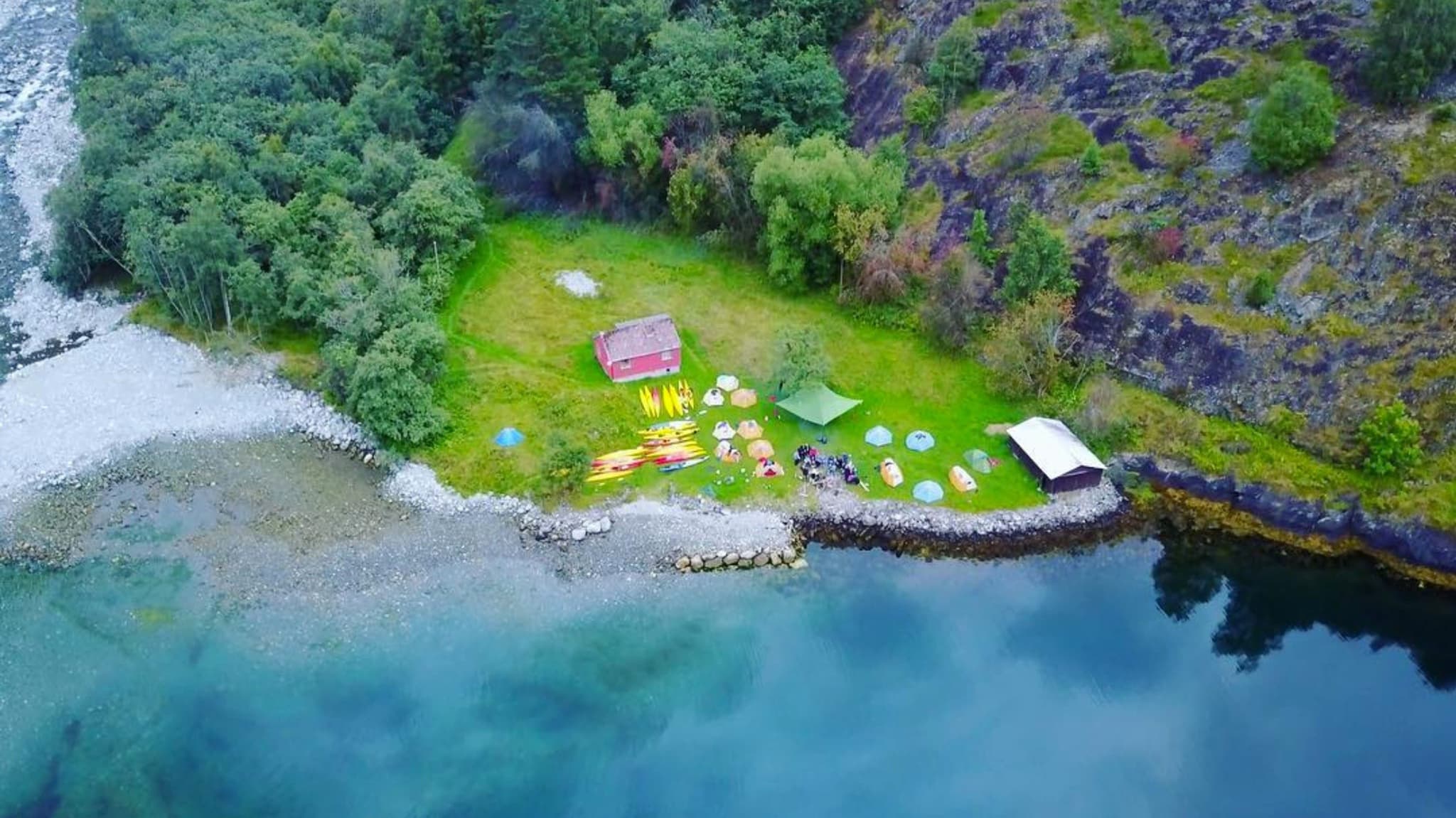 Aerial shot of a campsite in the Norwegian fjords.