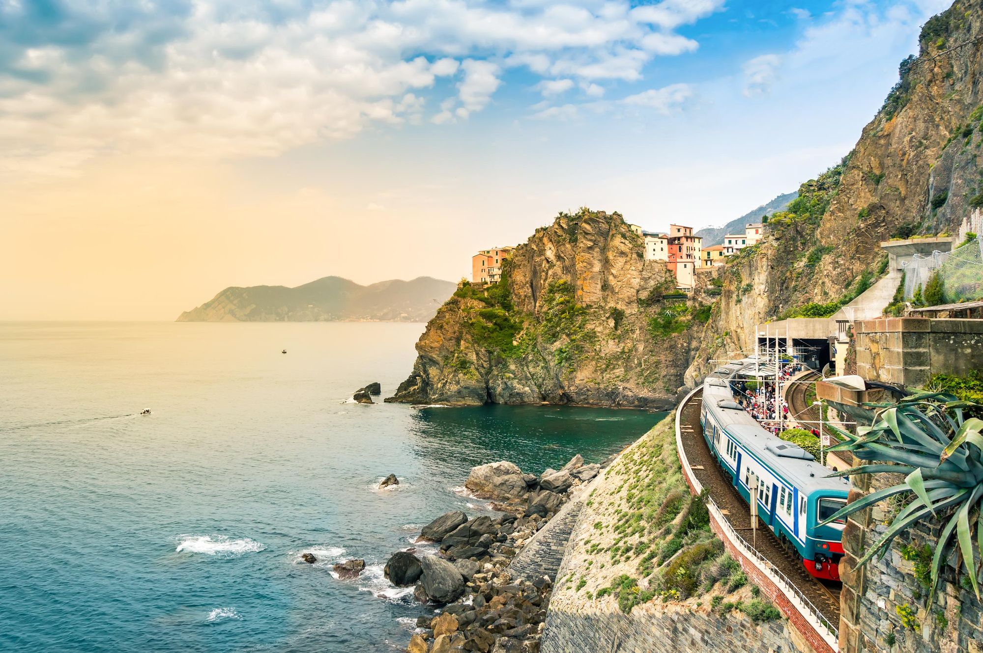 The train station at Manarola, Cinque Terre, with the rugged coastline of Liguria, Italy beyond. Photo: Getty