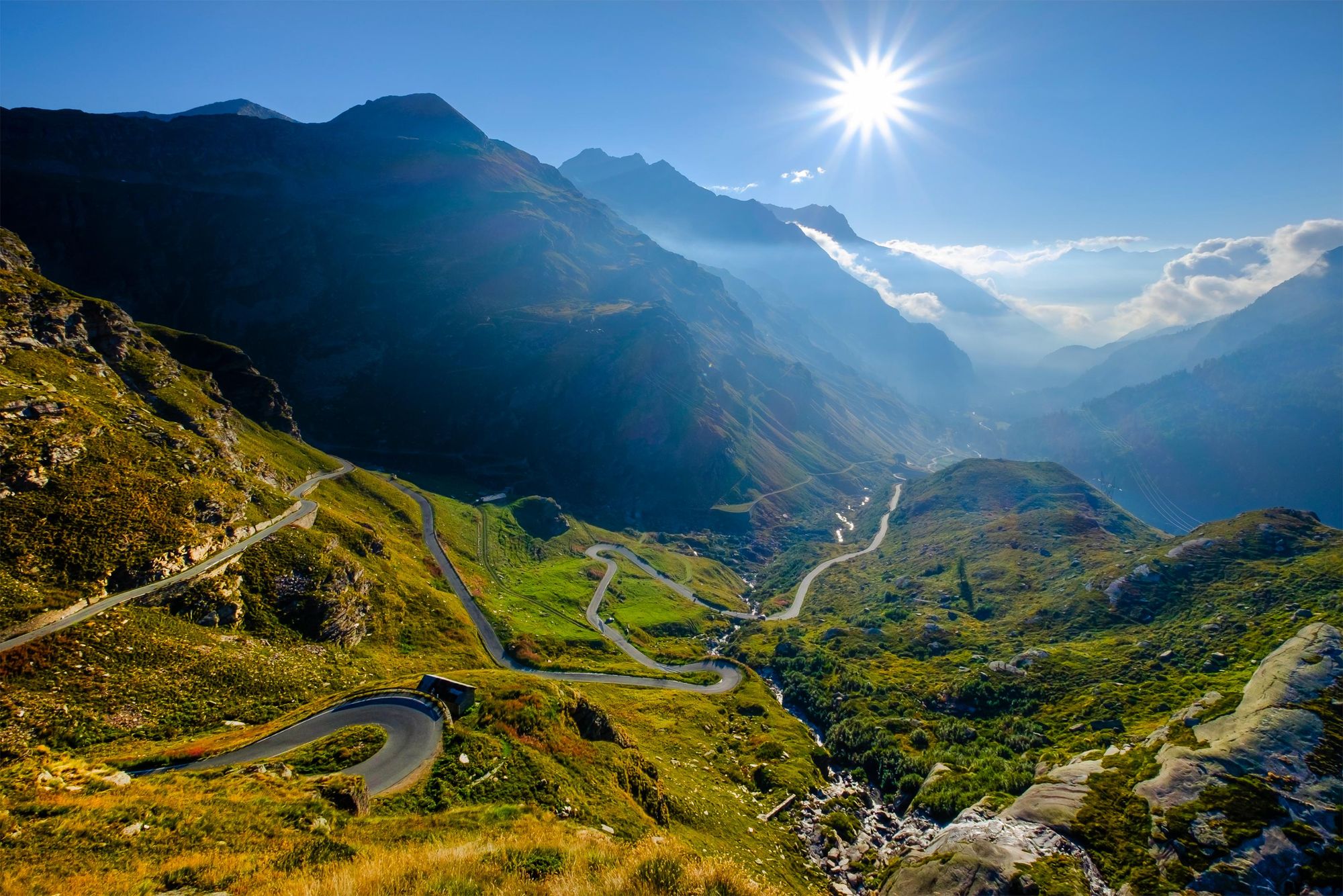 The high Orco Valley with the winding road going up towards the Nivolet pass. Gran Paradiso National Park, Piedmont, Italy. Photo: Getty