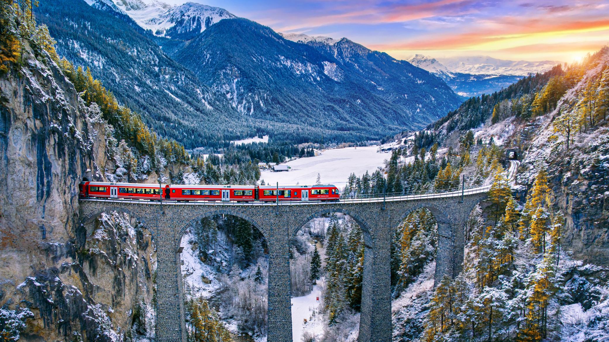 A train crossing the Landwasser Viaduct in the Swiss Alps. Photo: Getty.