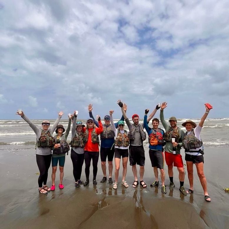 10 men and women on the beach in Costa Rica