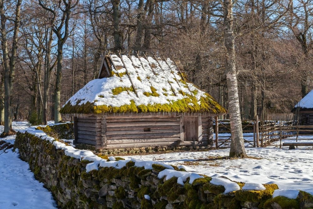 A snow-covered log sauna in Estonia, built in the traditional style. Photo: Getty