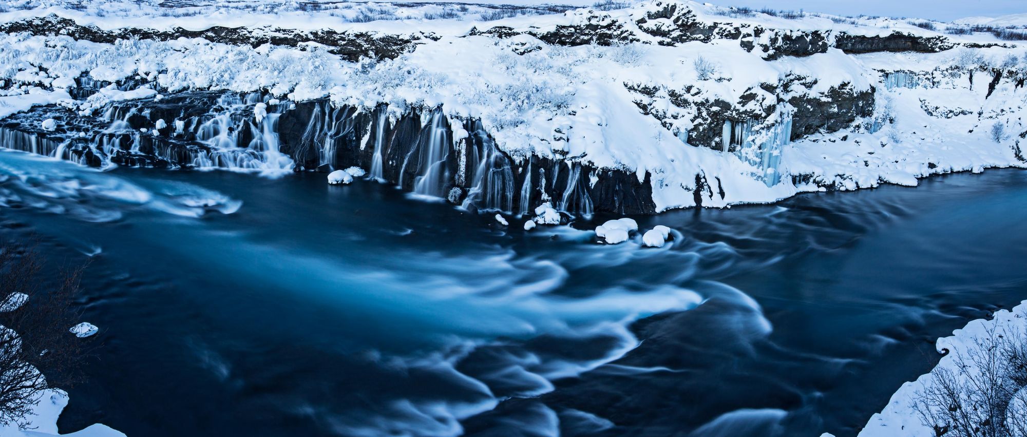 The famous Hraunfossar waterfall in winter. Photo: Getty