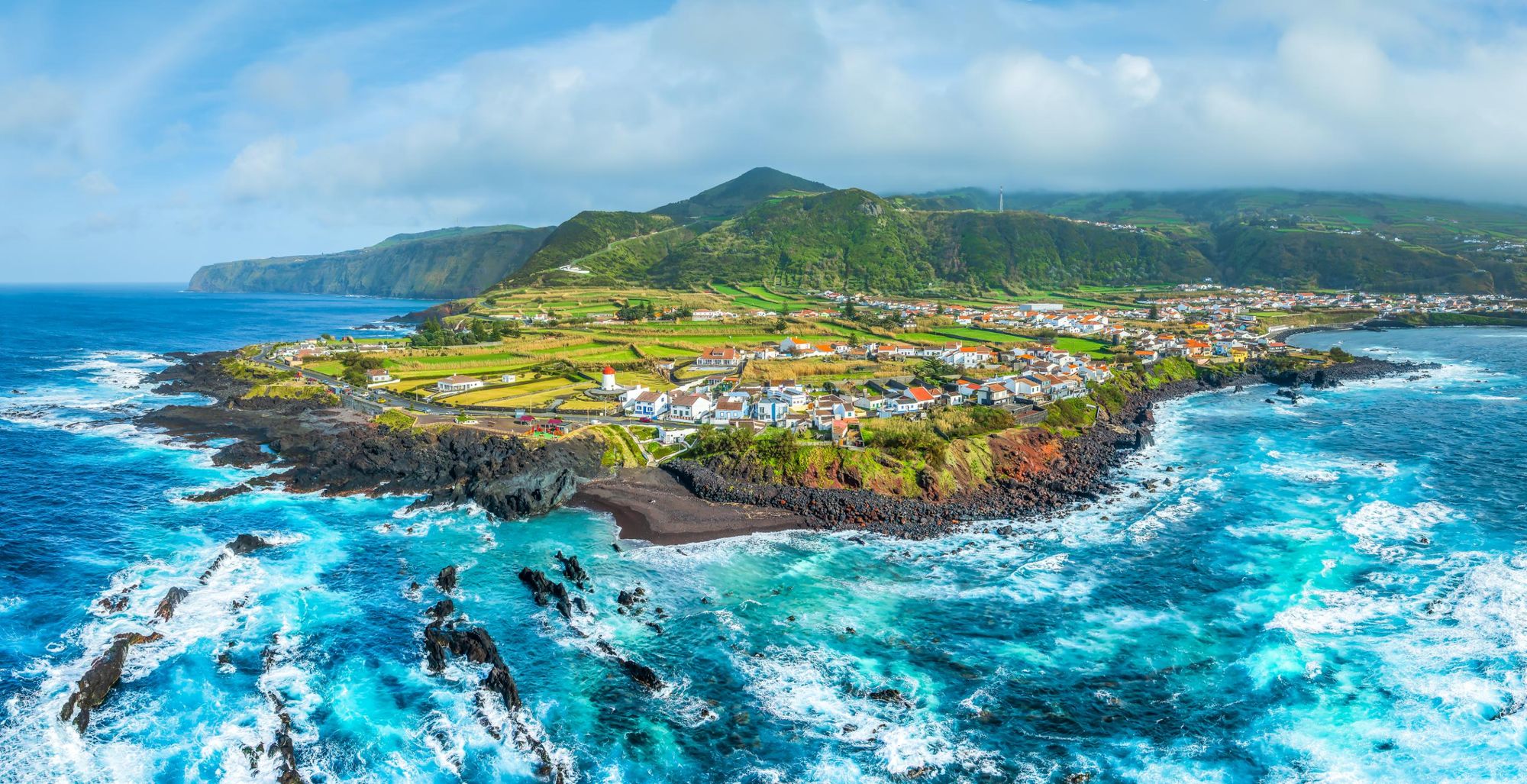 Mosteiros, the gem of São Miguel, with its dramatic volcanic landscape meeting the Atlantic. Photo: Getty