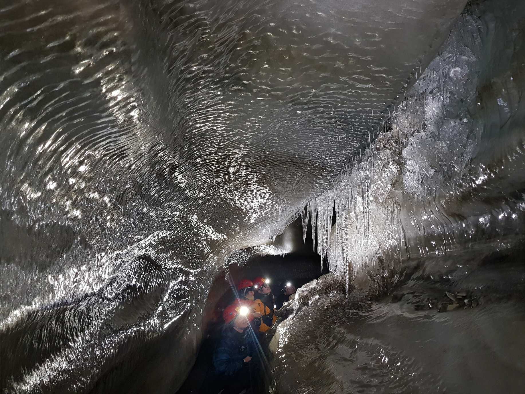 Explorations within an ice cave. Photo: Martin Fiala.